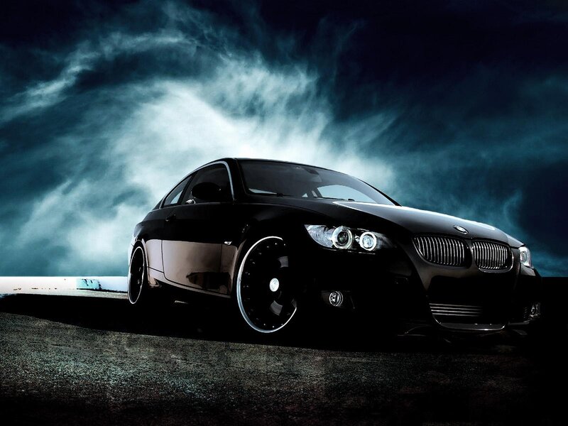Black BMW coupe at night