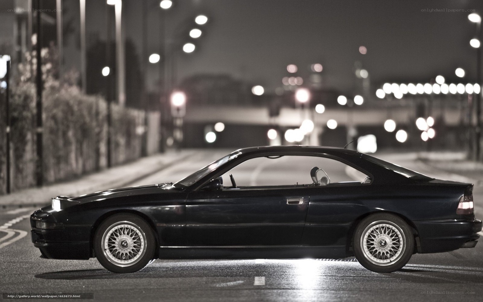 Black BMW coupe at night