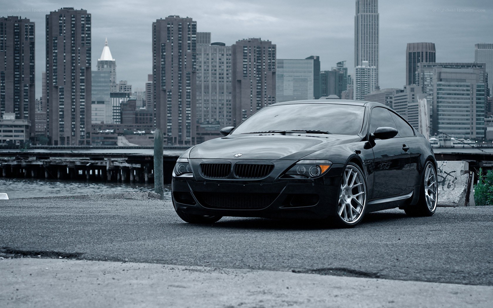 Black BMW coupe in city