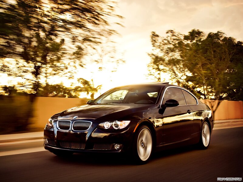 black bmw coupe in motion