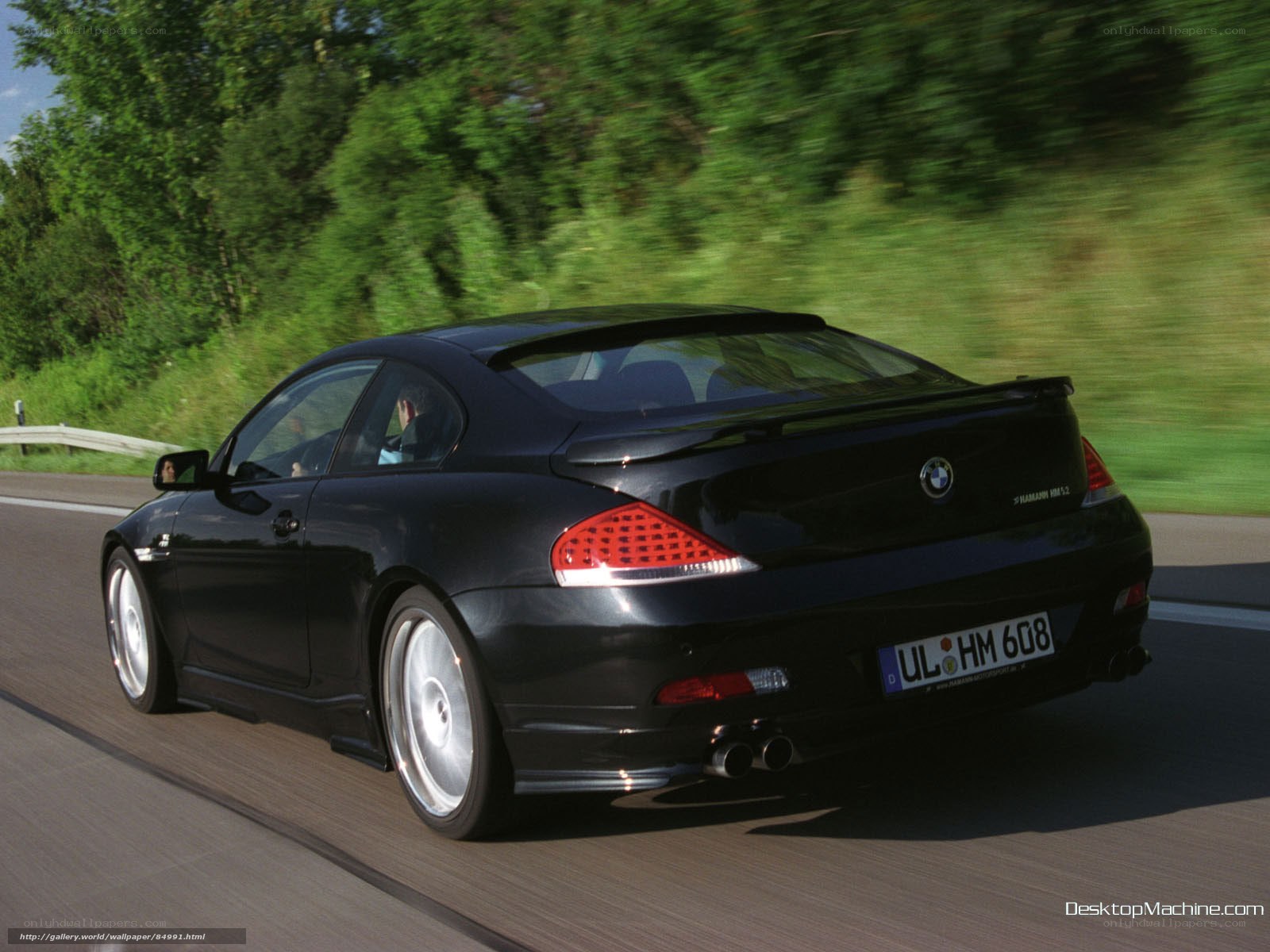 black bmw coupe in motion