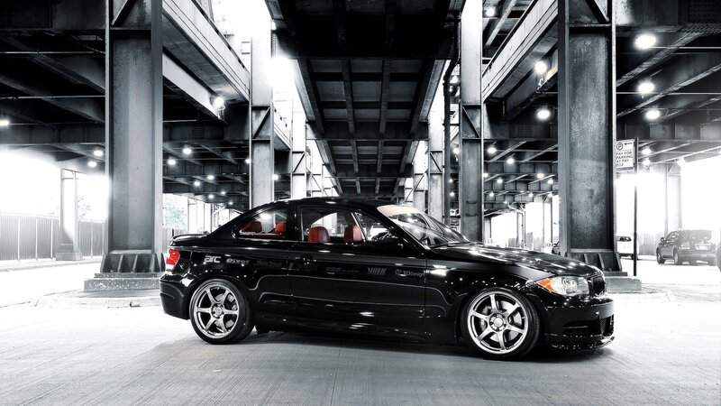 black bmw coupe in parking garage