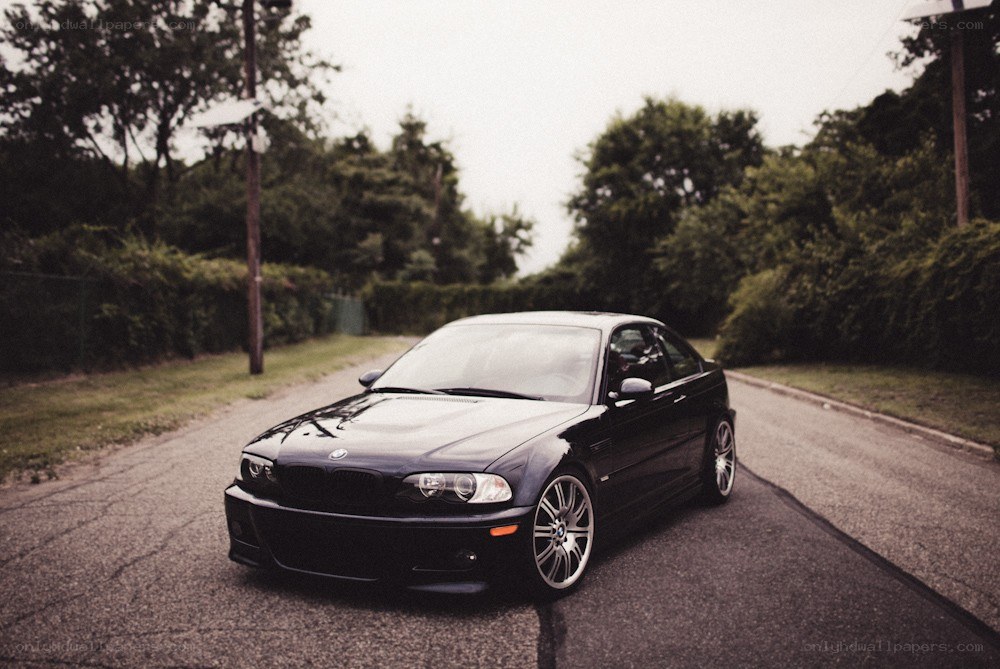 black bmw coupe on a road
