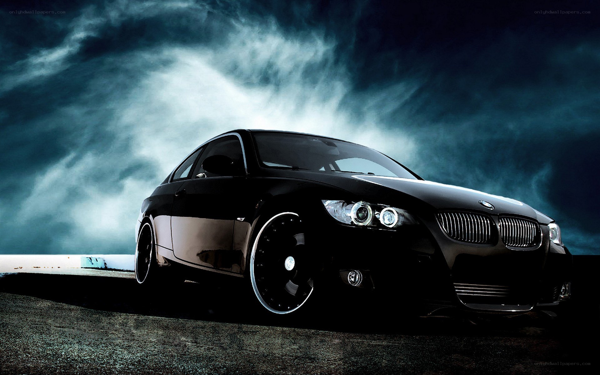 black bmw coupe on dark road