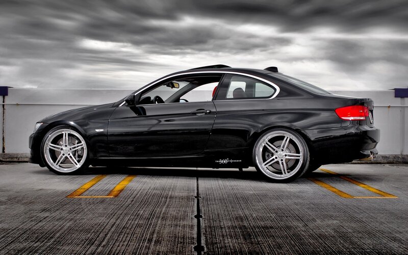 black bmw coupe on parking lot