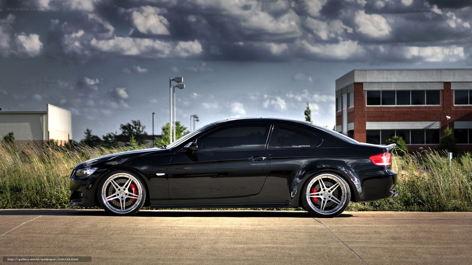 Black BMW coupe on pavement