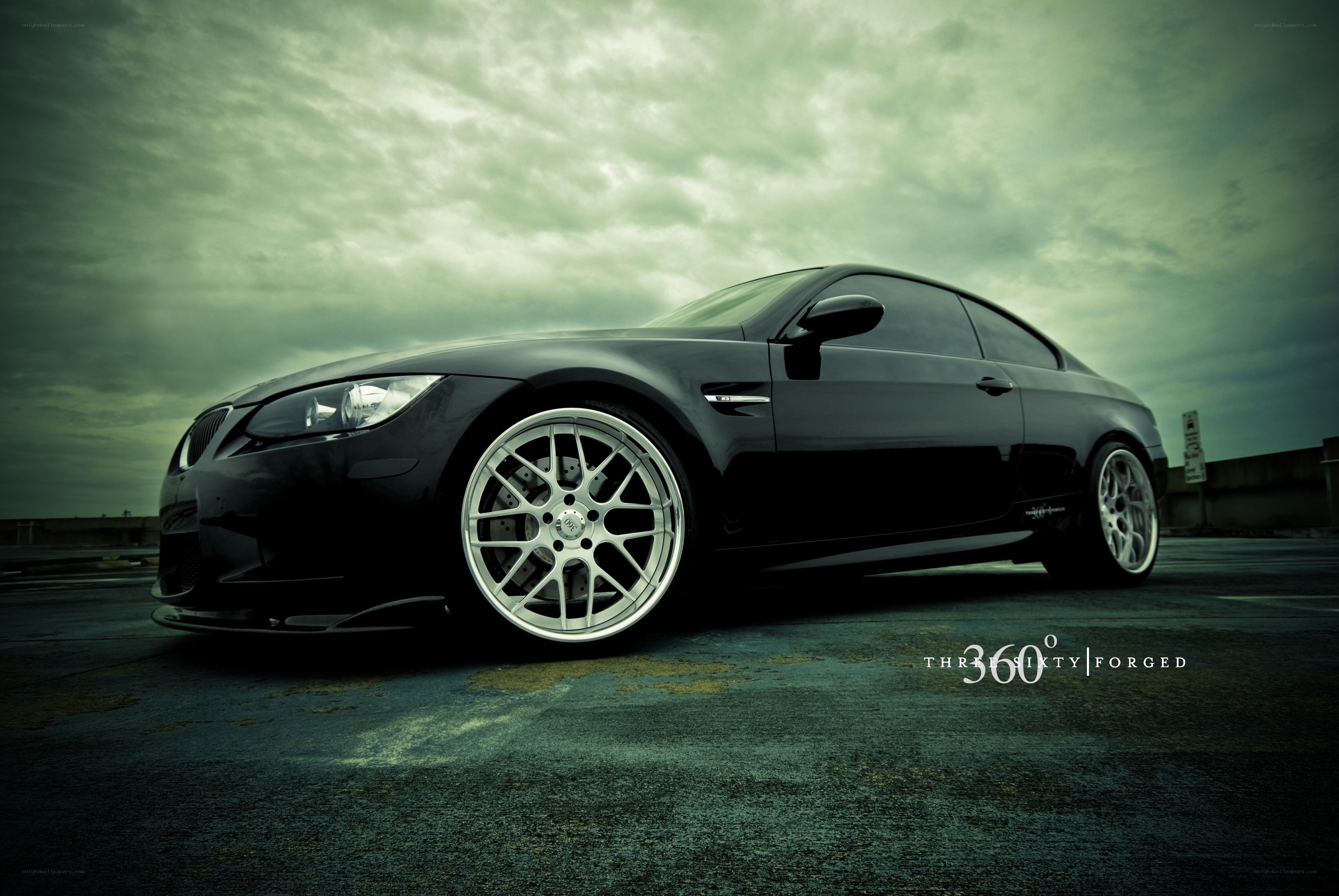 black bmw coupe on rooftop