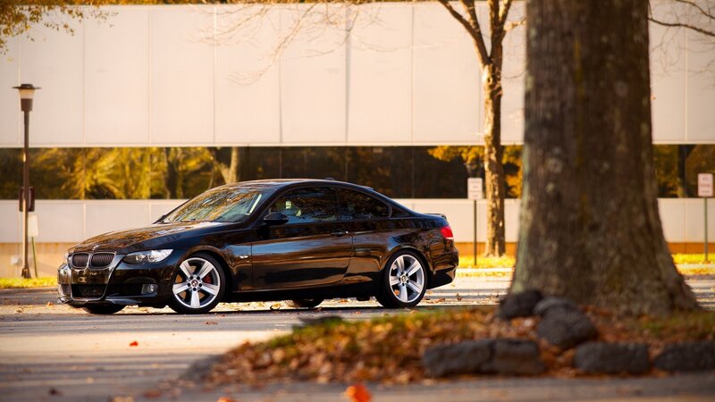 black bmw coupe on street