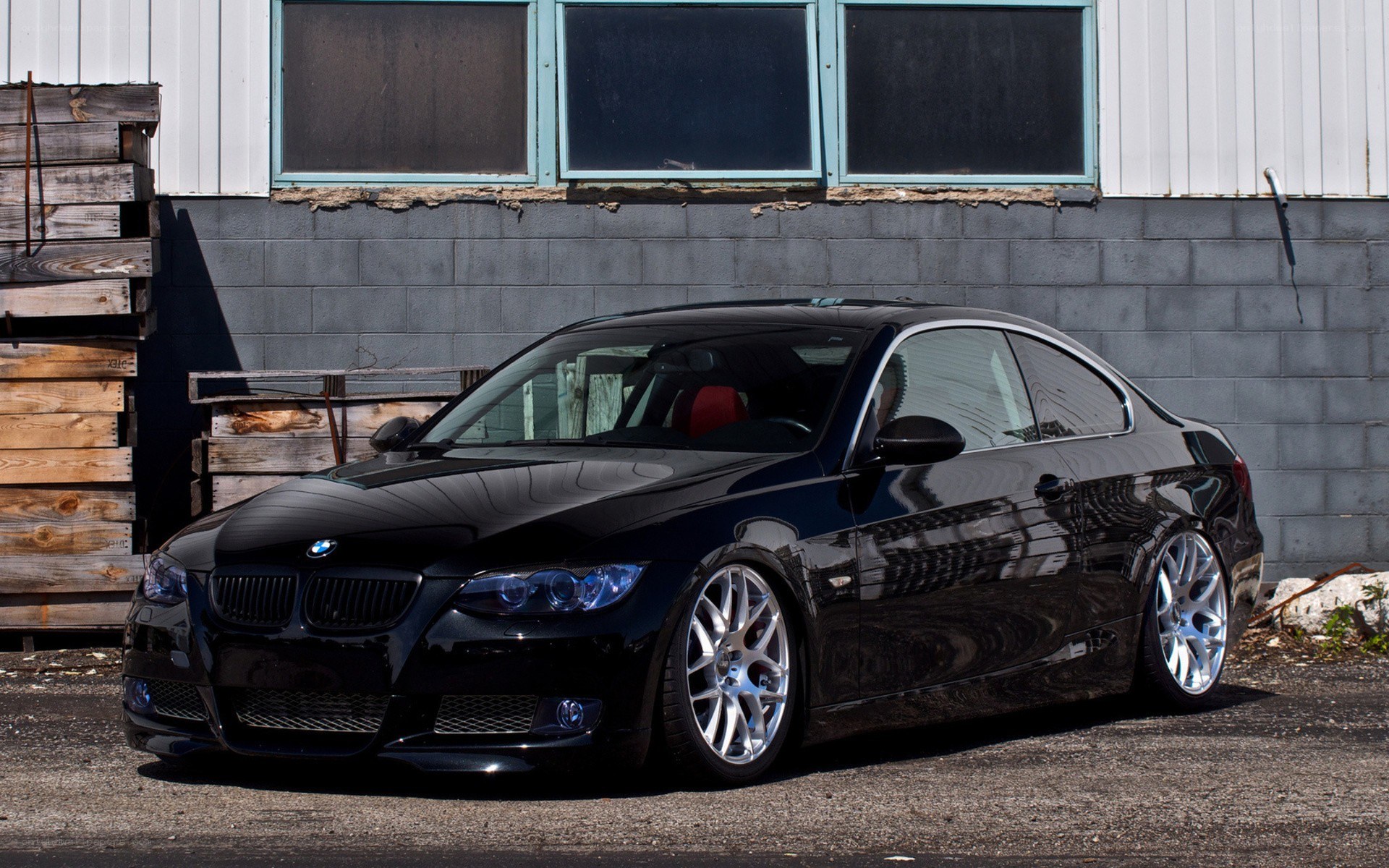 black bmw coupe parked