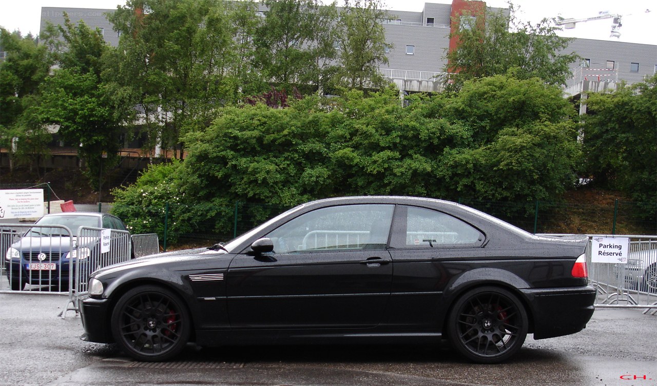 black bmw coupe parked