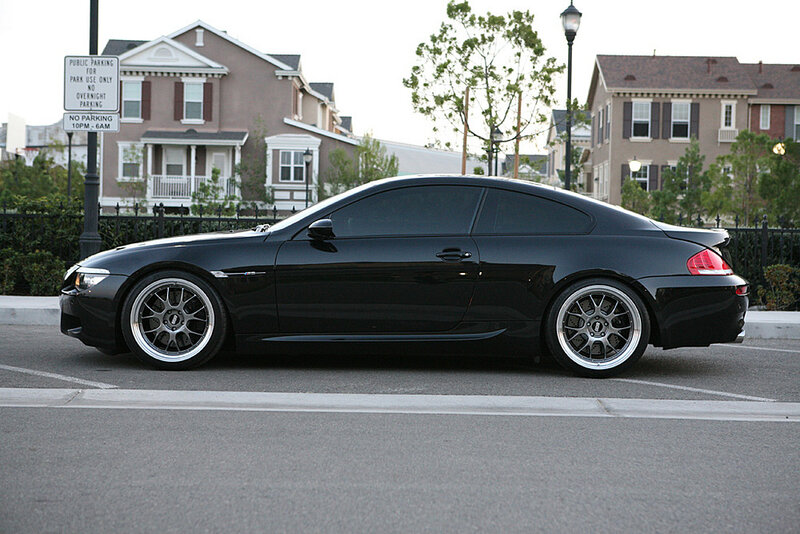 black bmw coupe parked on street