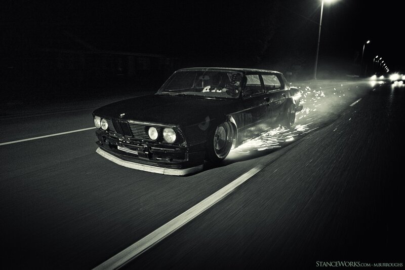 Black BMW drifting at night