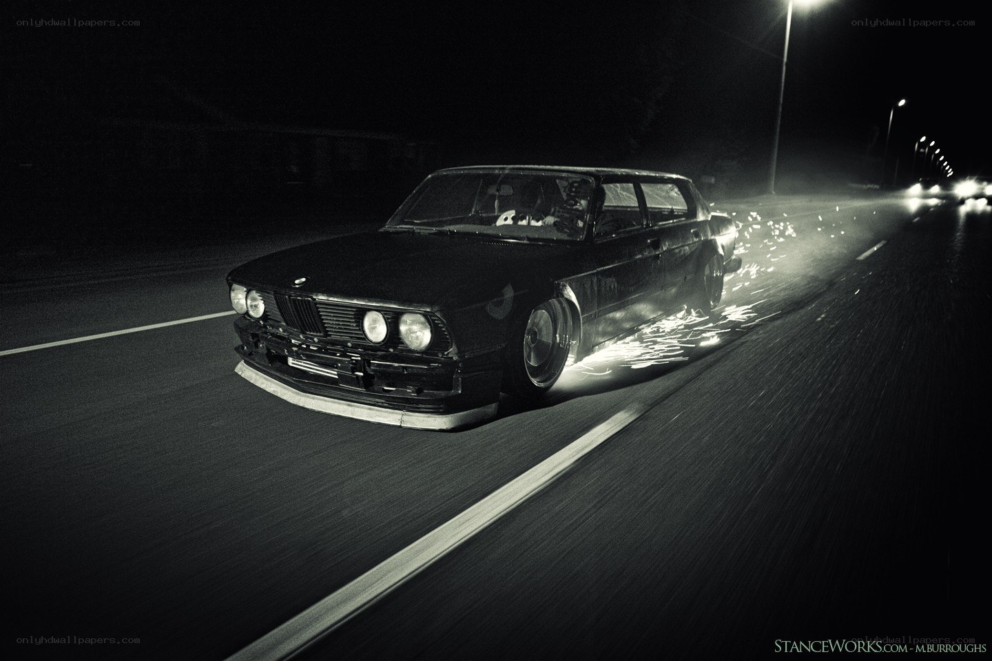 Black BMW drifting at night