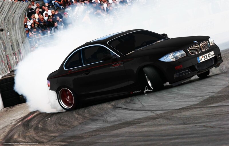 Black BMW drifting on track