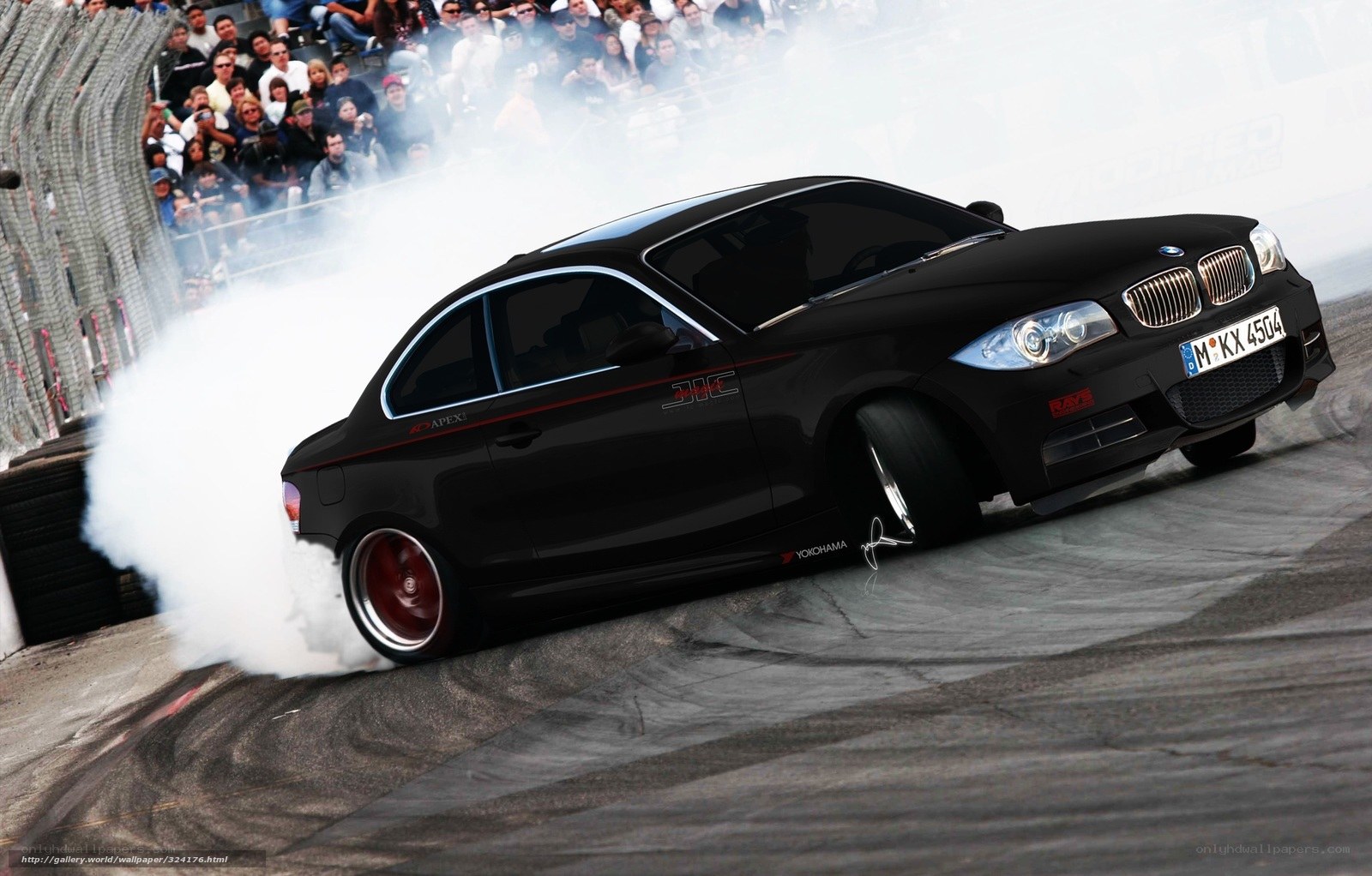 Black BMW drifting on track