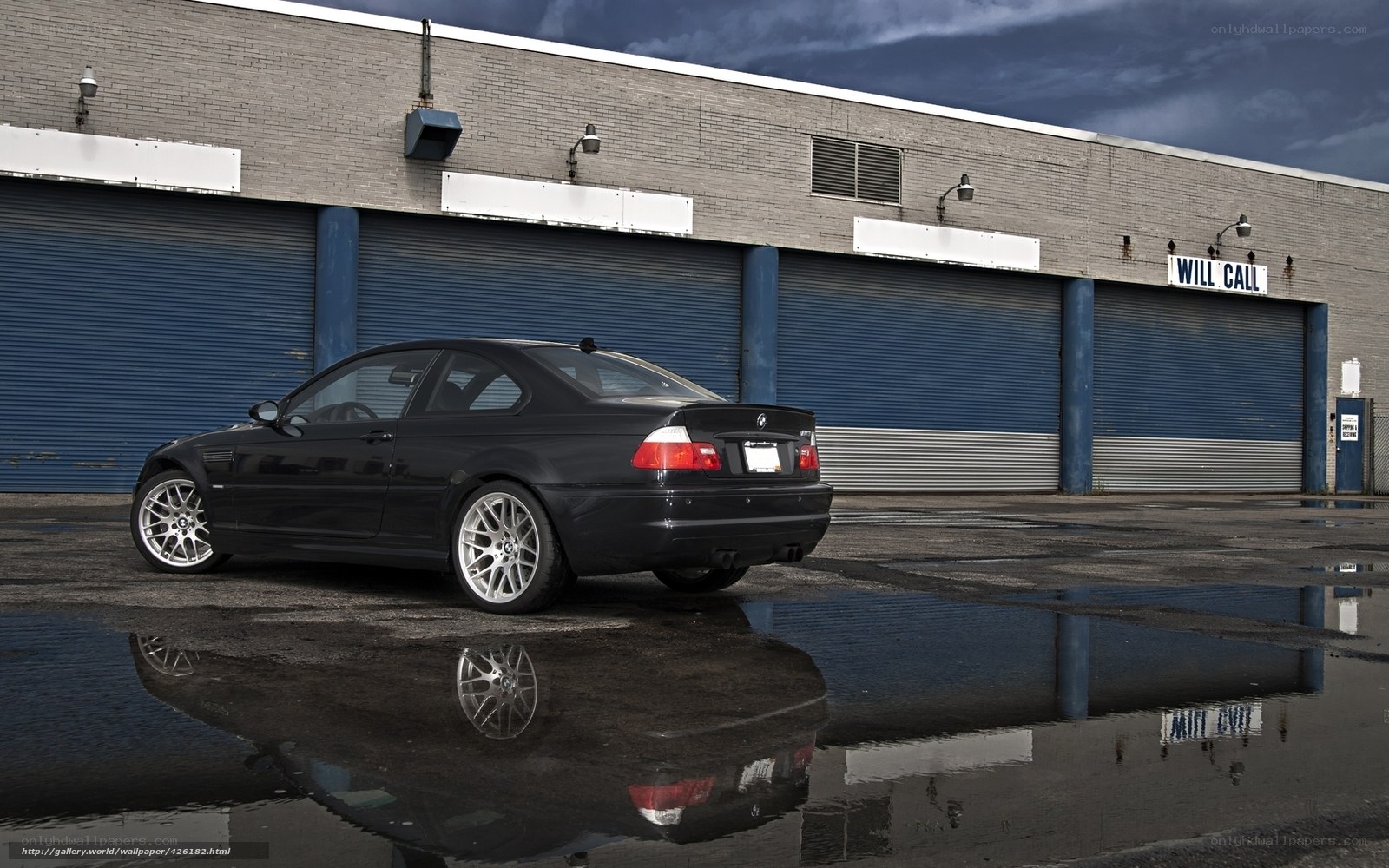 Black BMW in a parking lot