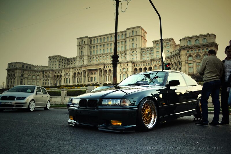 Black BMW in front of Palace