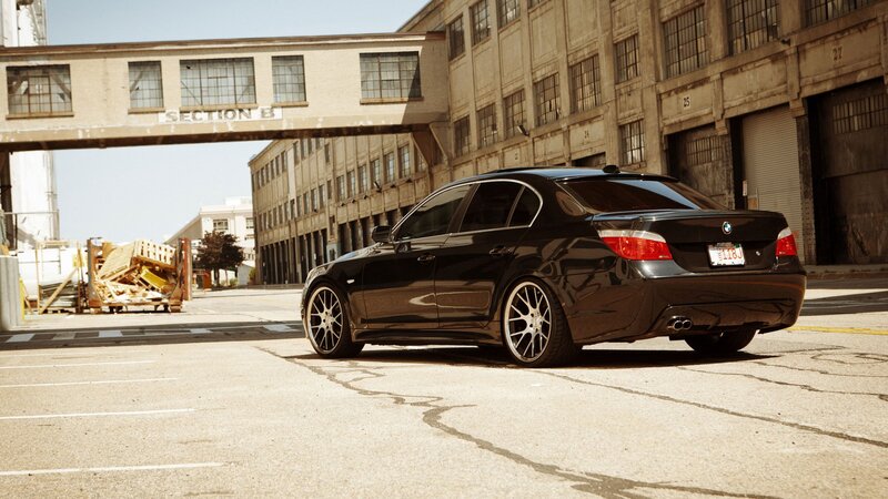 black bmw in industrial area