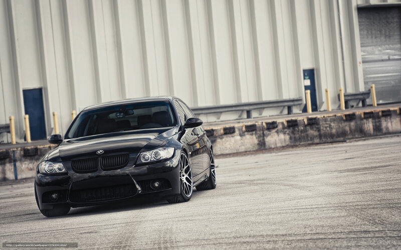 black bmw in industrial area