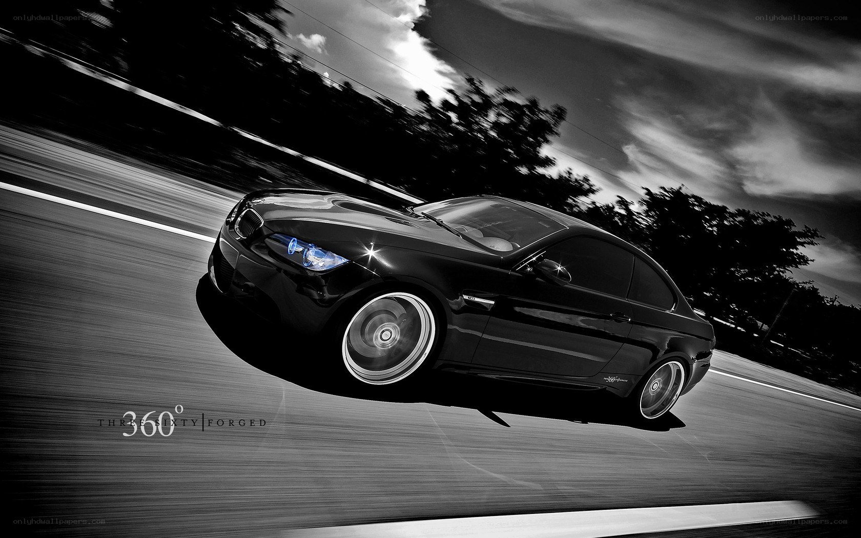Black BMW in motion
