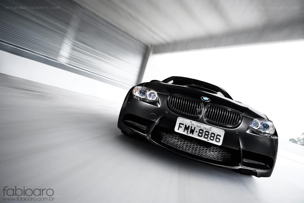 Black BMW in motion