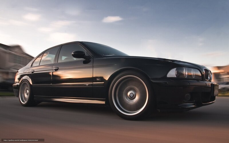 Black BMW in motion