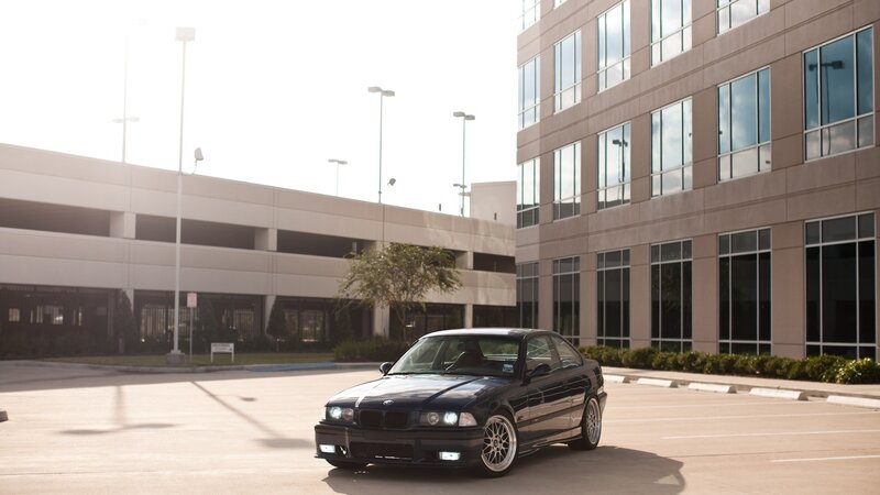 black bmw in parking lot
