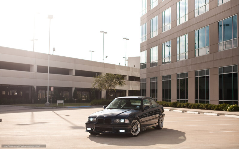 Black BMW in parking lot