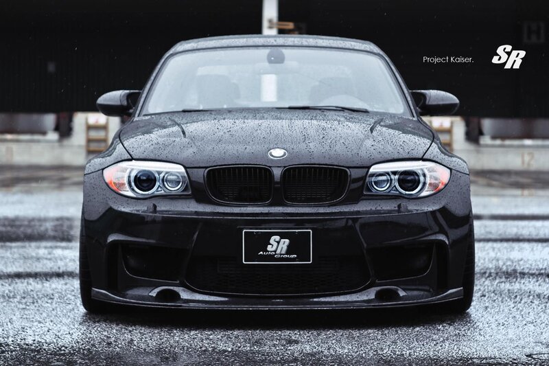 Black BMW in rain