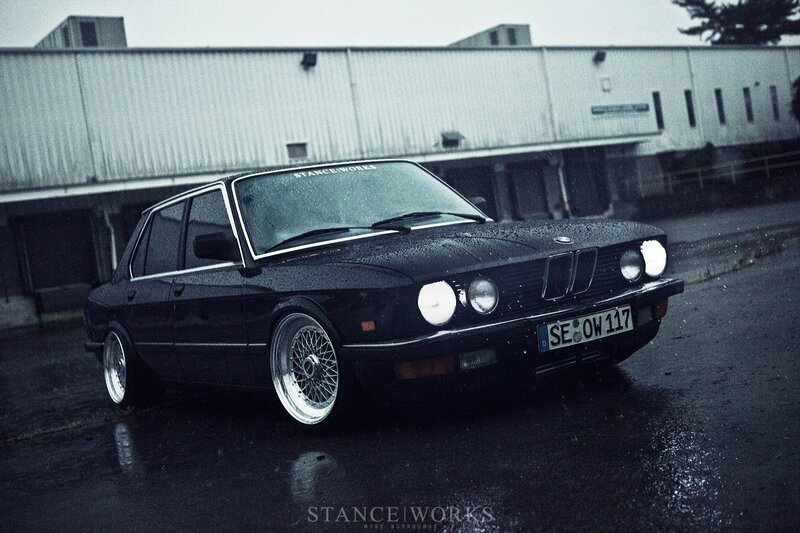 Black BMW in the rain