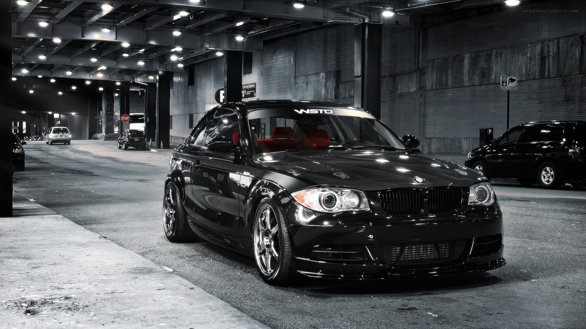 black bmw in underground parking