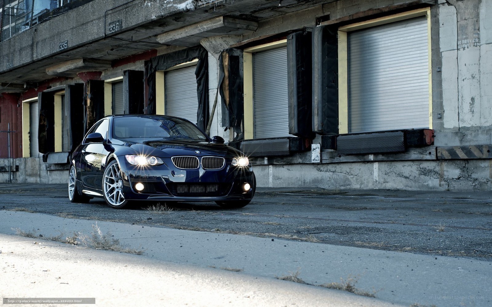Black BMW in urban setting