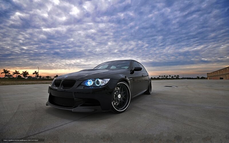 Black BMW M3 at sunset