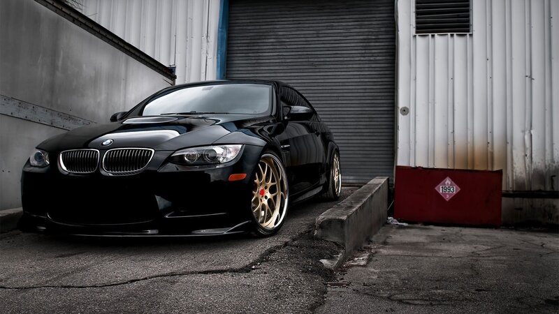 Black BMW M3 Coupe — Dramatic, Photograph, Garage Door
