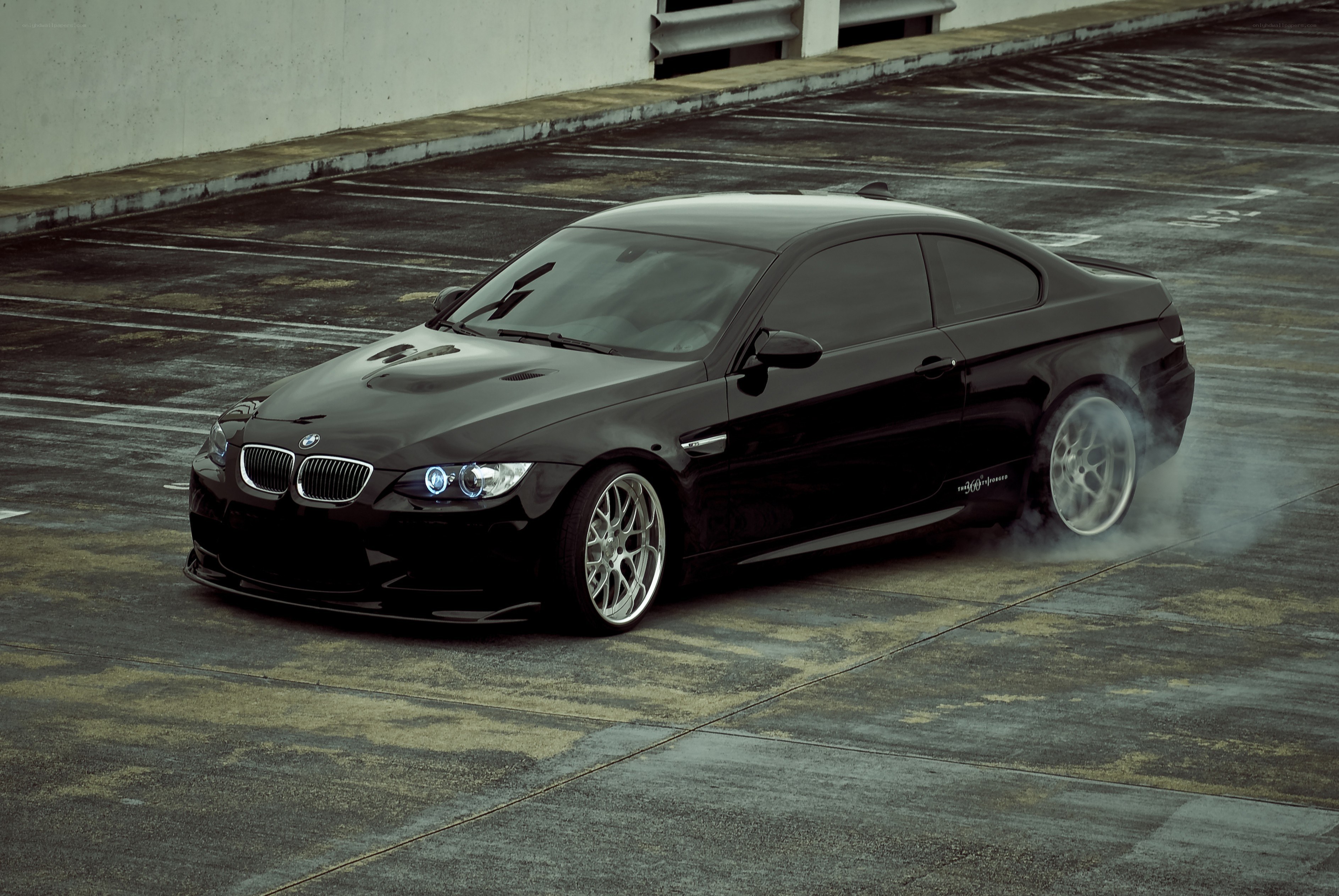 Black BMW M3 drifting