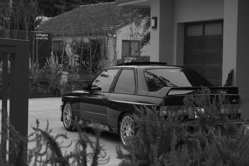 Black BMW M3 in driveway