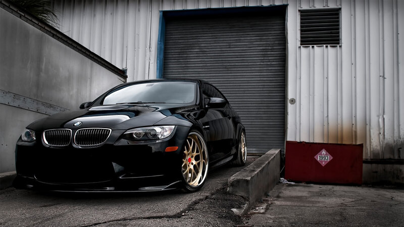 black bmw m3 in garage