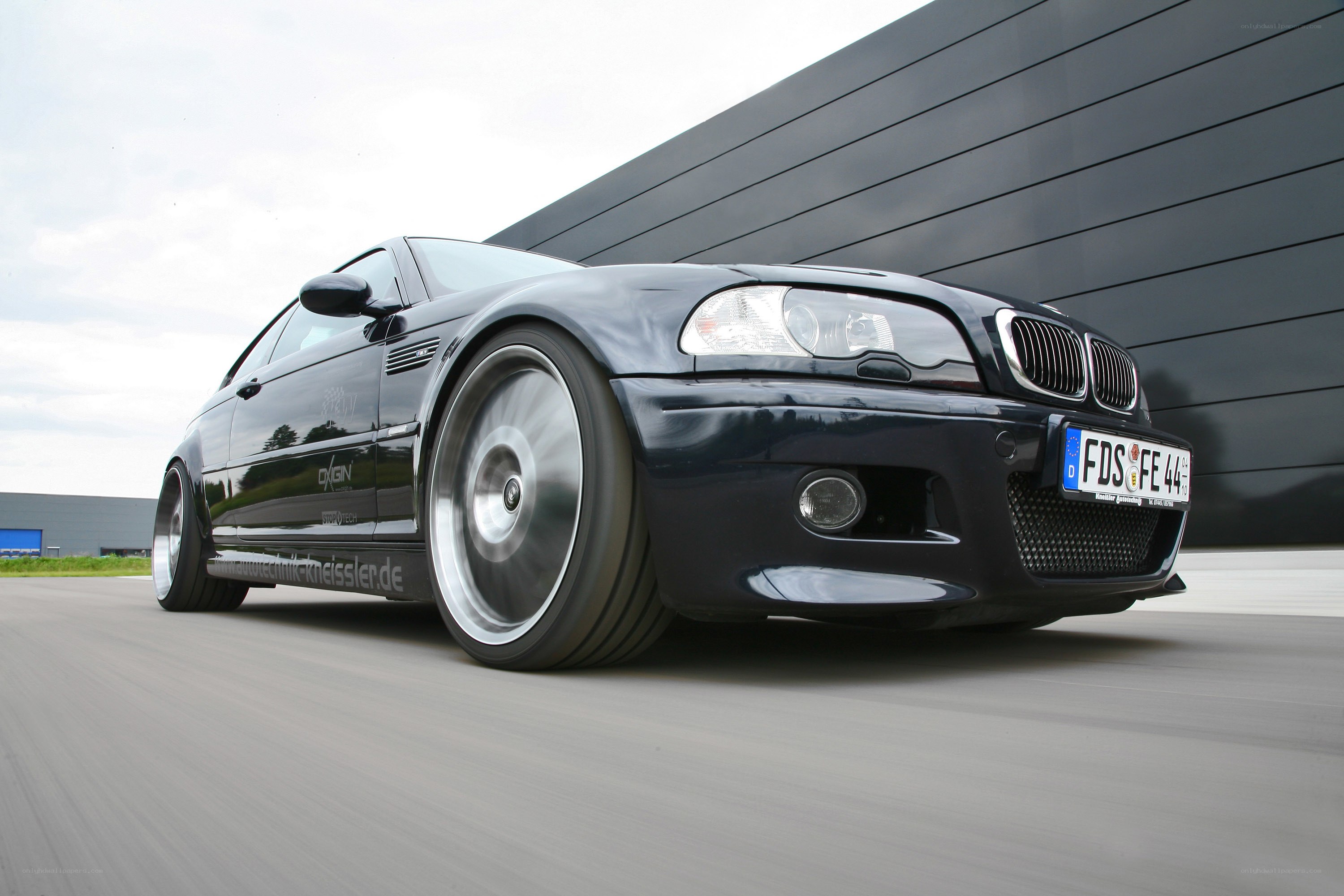 black bmw m3 in motion