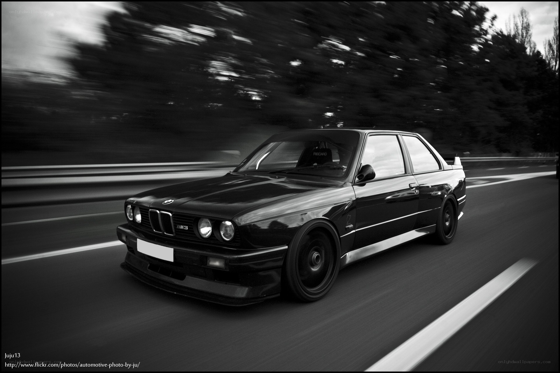 Black BMW M3 in motion