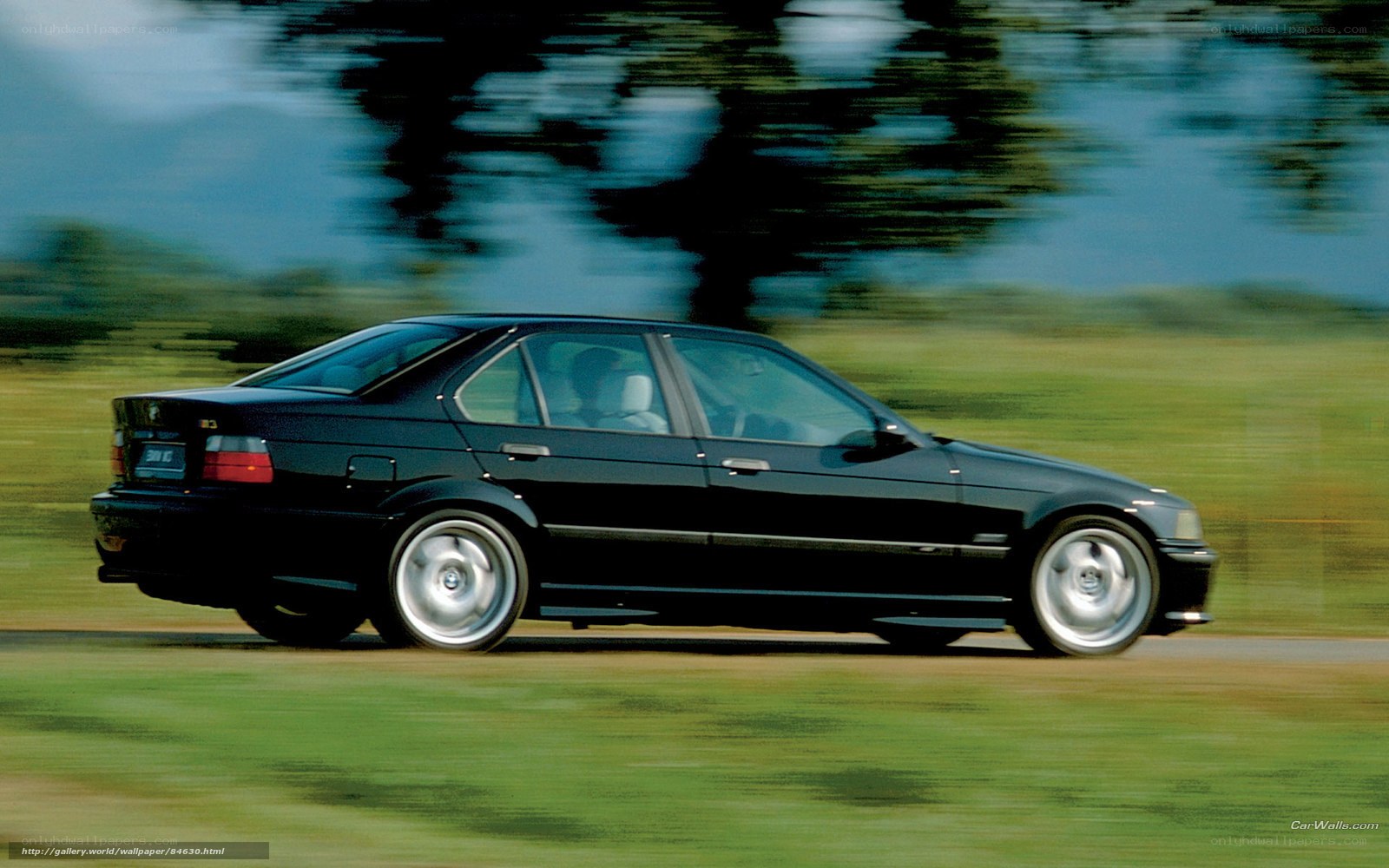 black bmw m3 in motion