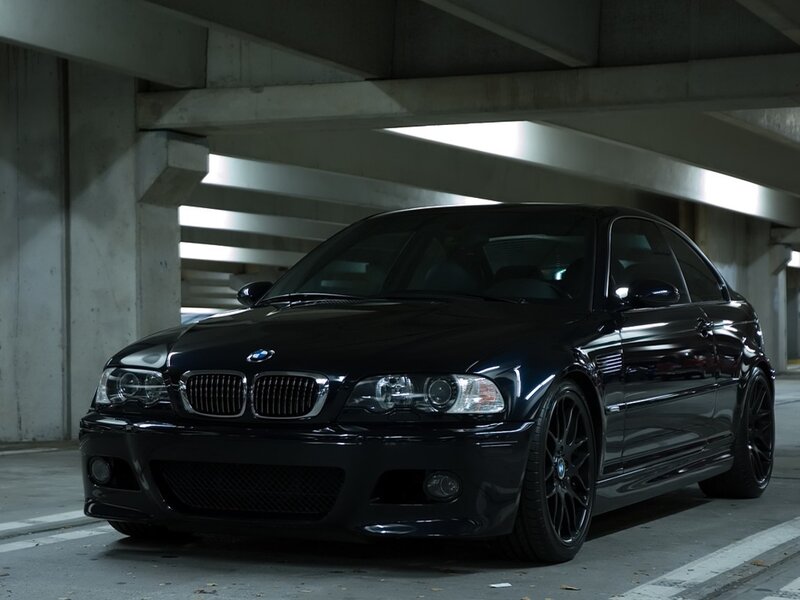 Black BMW M3 in parking garage