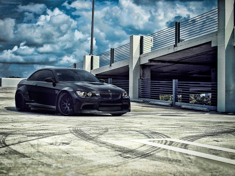 Black BMW M3 in parking garage