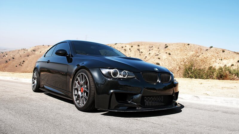 Black BMW M3 on a desert road
