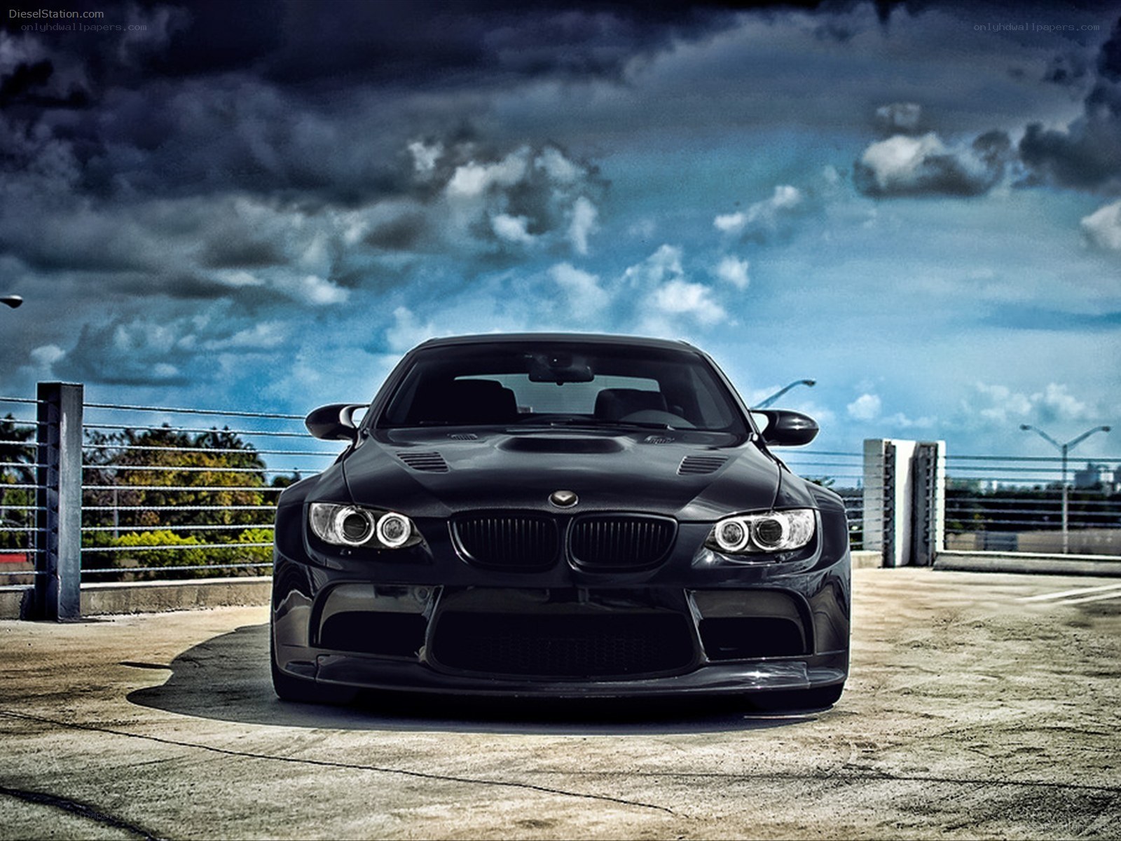 Black BMW M3 on a rooftop