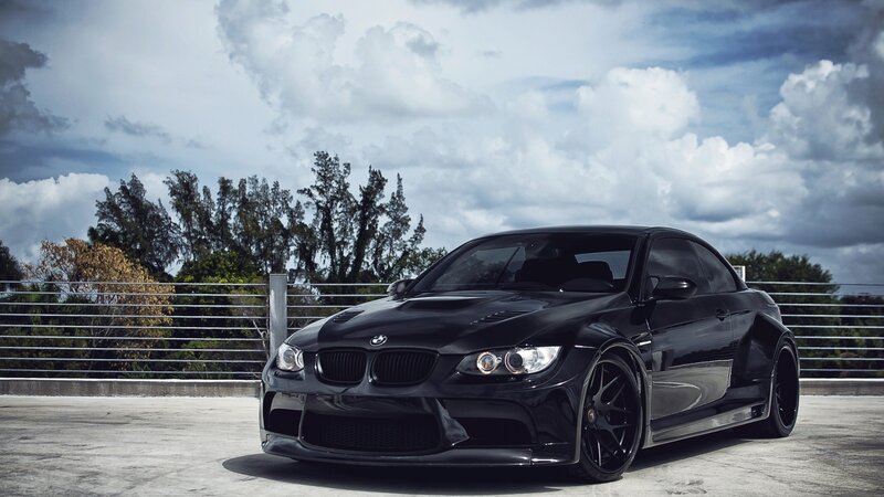 Black BMW M3 on a rooftop