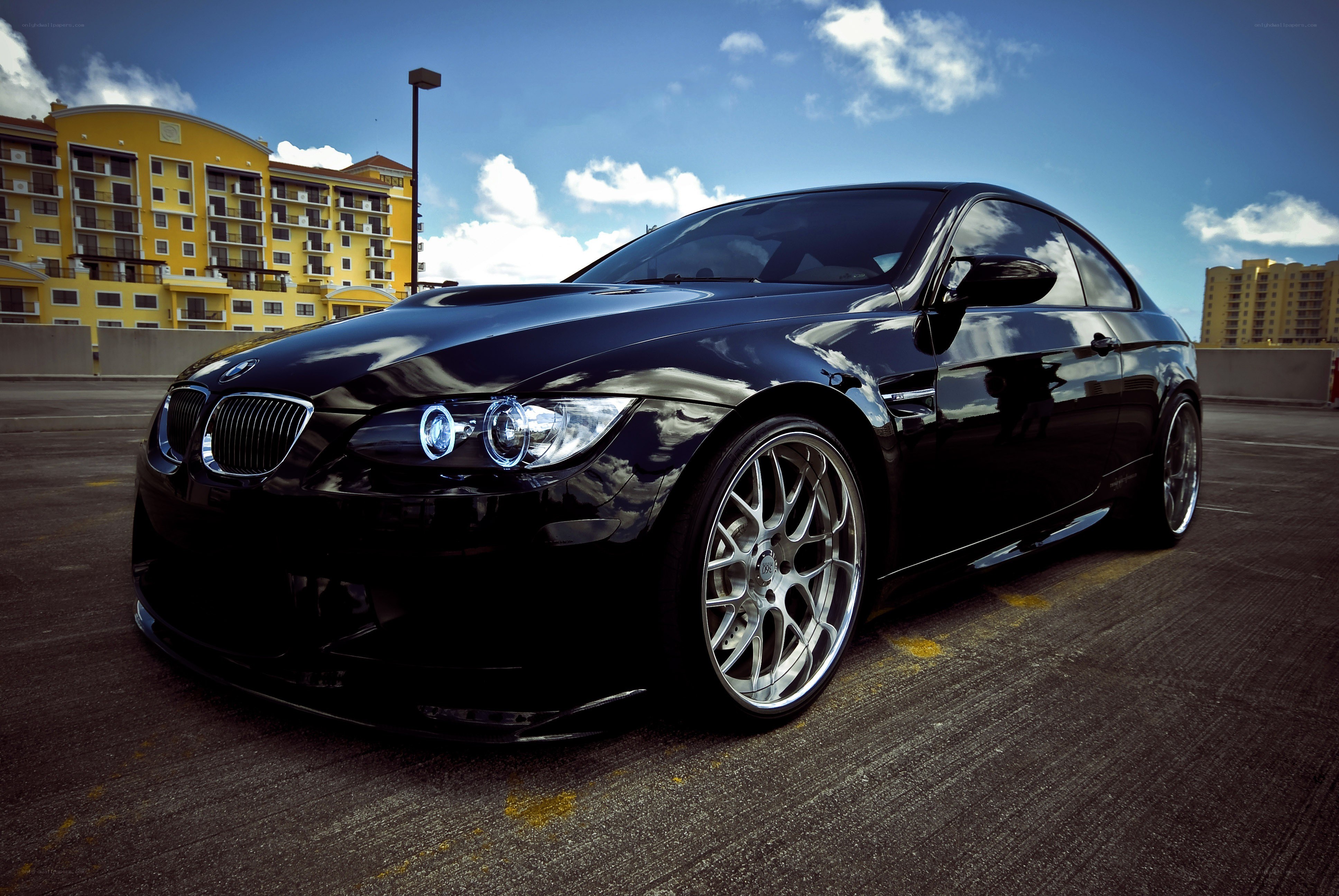 Black BMW M3 on a rooftop