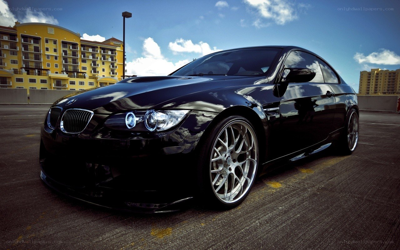 Black BMW M3 on a rooftop