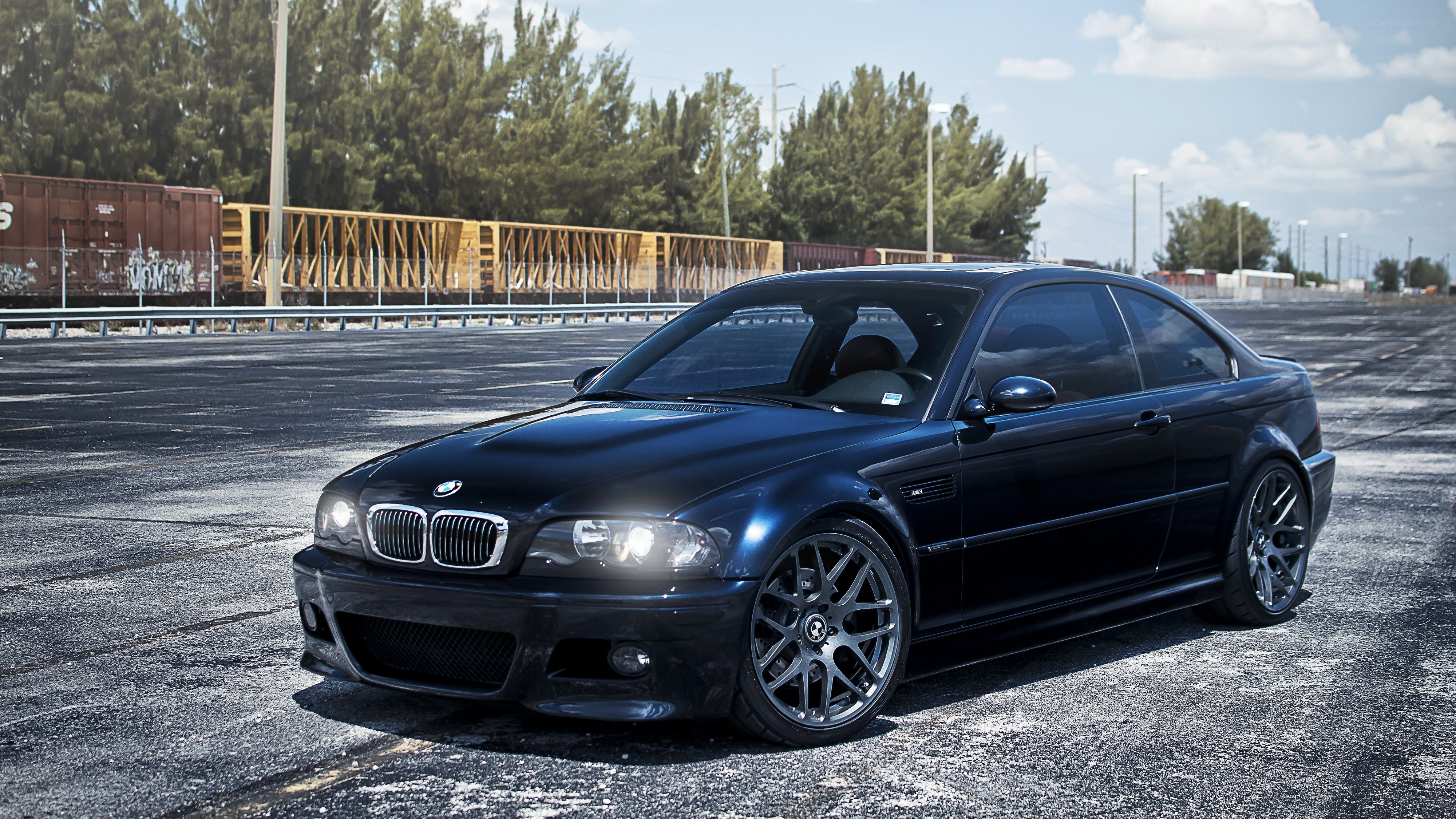 Black BMW M3 on asphalt