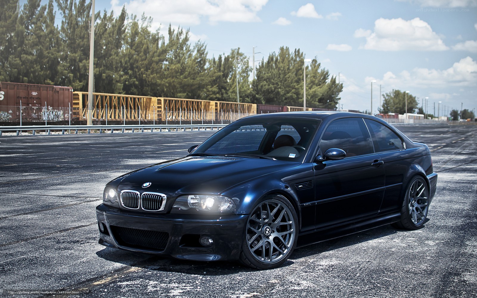 Black BMW M3 on asphalt