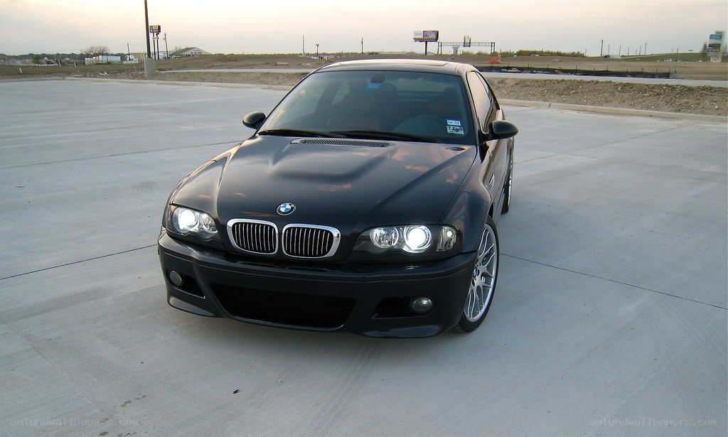 black bmw m3 on concrete